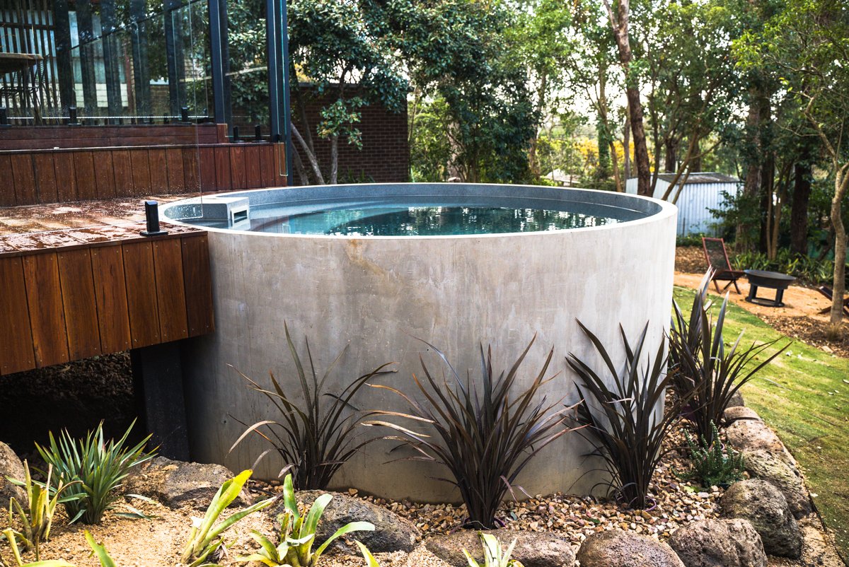 Concrete plunge pool in a garden setting